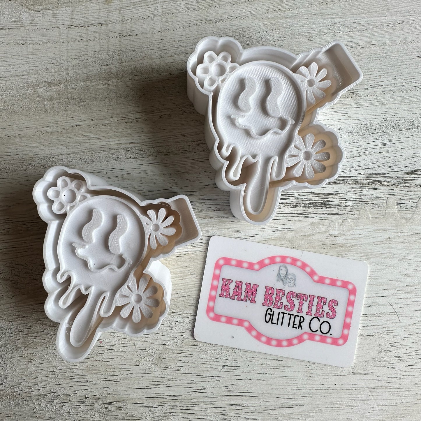 Drippy flower smiley vent clip mold